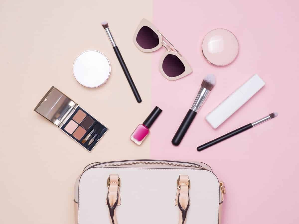 a bunch of women's accessories and beauty products