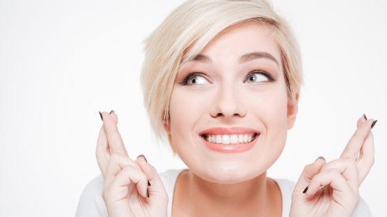 a woman who is happy while also being anxious