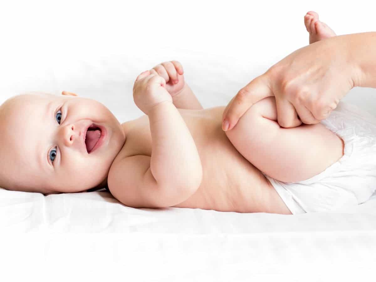 a baby doing bicycle exercise to help fart