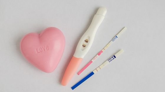 a bunch of positive pregnancy tests