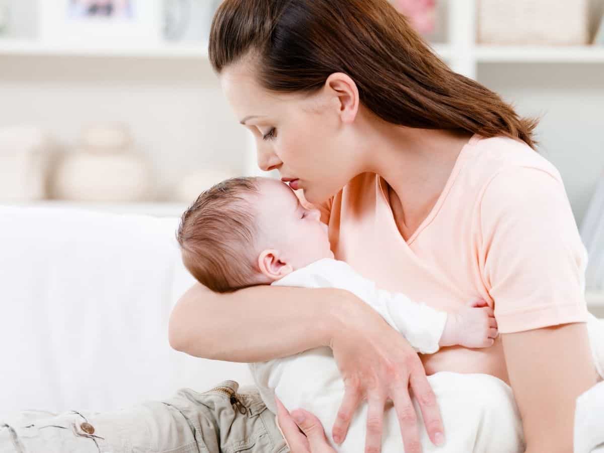 a mom soothing her baby