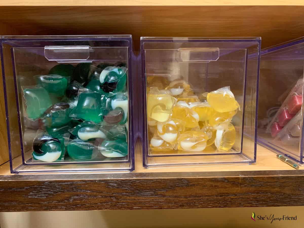 two clear storage drawers with tide pods and gentle tide pods