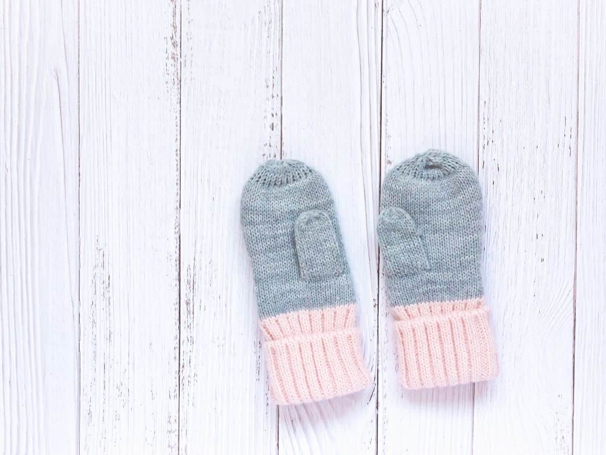 a pair of baby mittens