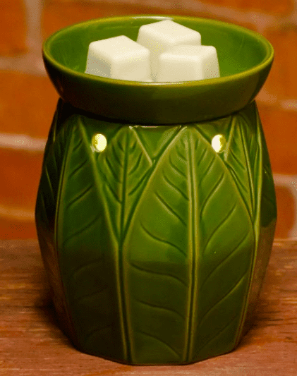 green banana leaf wax warmer with 3 wax cubes in it