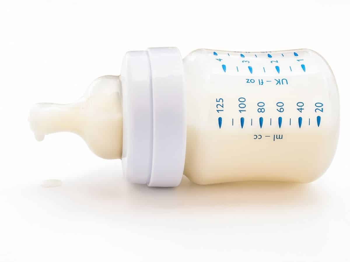 a bottle with baby formula