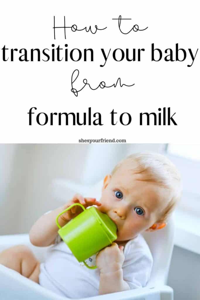 a baby learning to drink milk