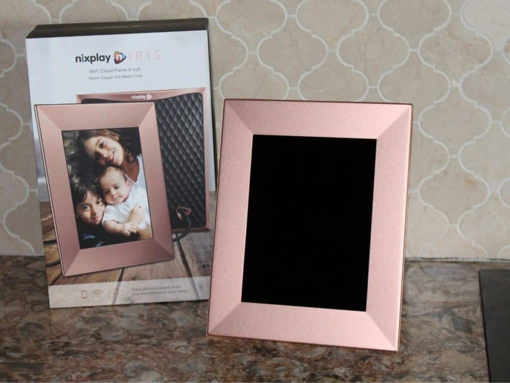 a rose gold nixplay iris digital photo frame