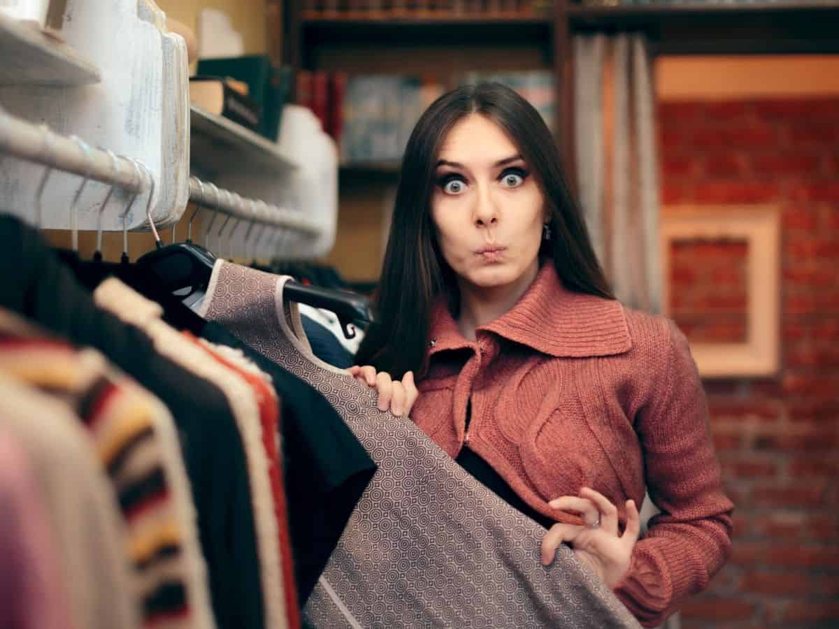 a woman excited looking at her clothes