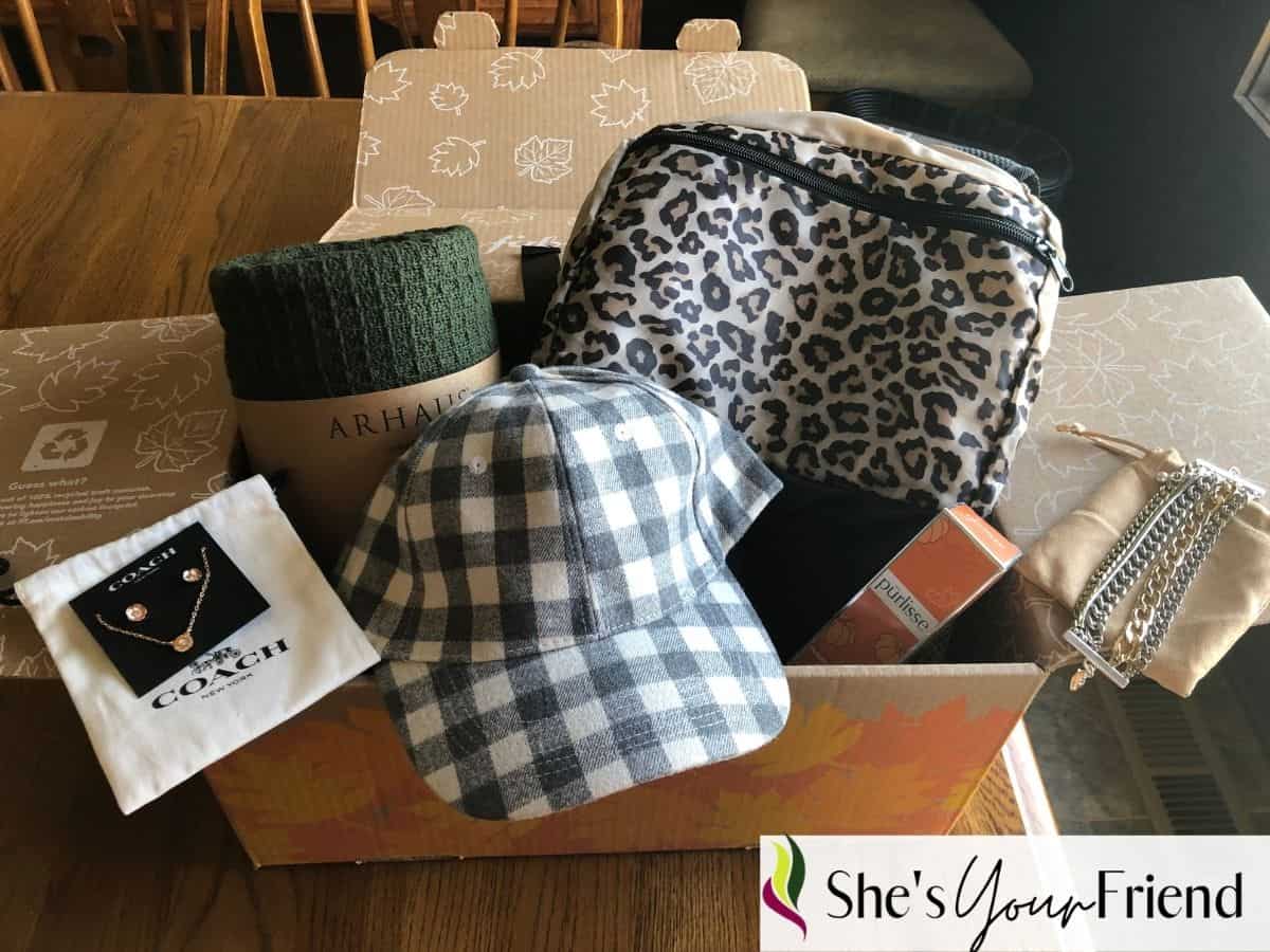 a look at whats inside the fabfitfun fall box including a blanket jewelry hat backpack and skincare