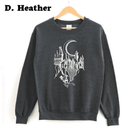 a gray sweatshirt with the Hogwarts castle printed on it