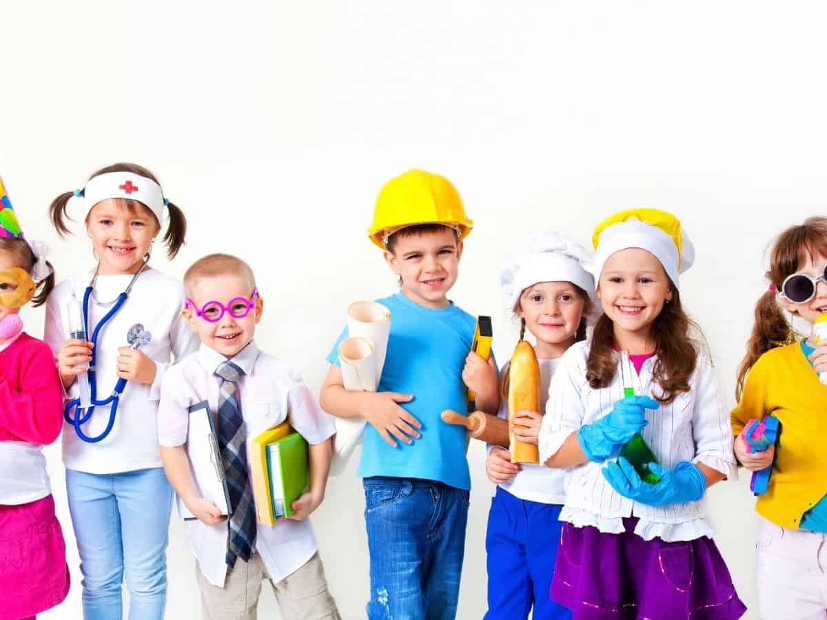 a bunch of kids dressed up in pretend career costumes