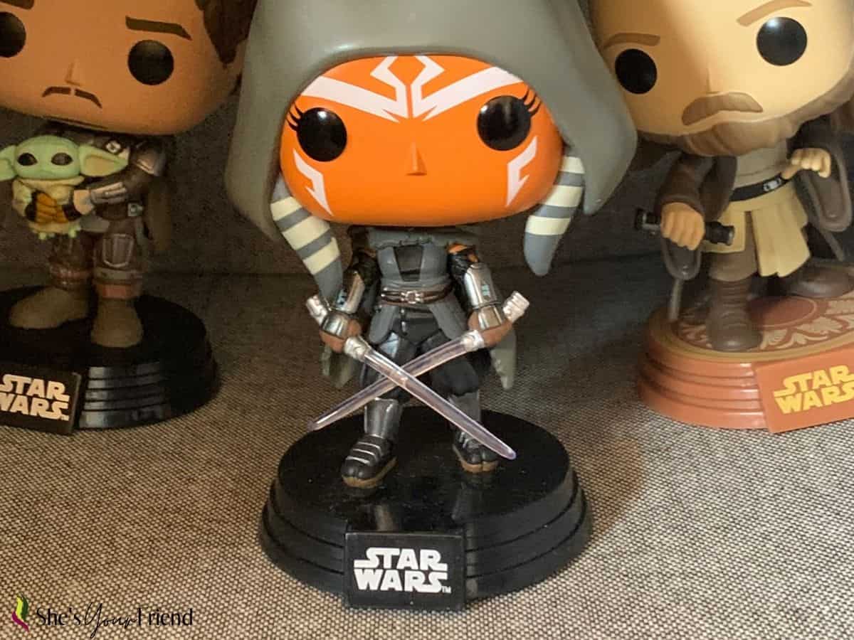 three funk-pop figurines from star wars with Ahsoka being the main focus