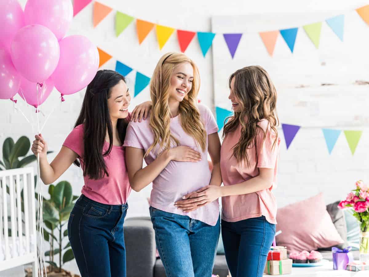 three women at a baby shower