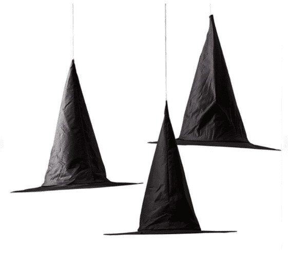 three witch hats hanging in the air with string