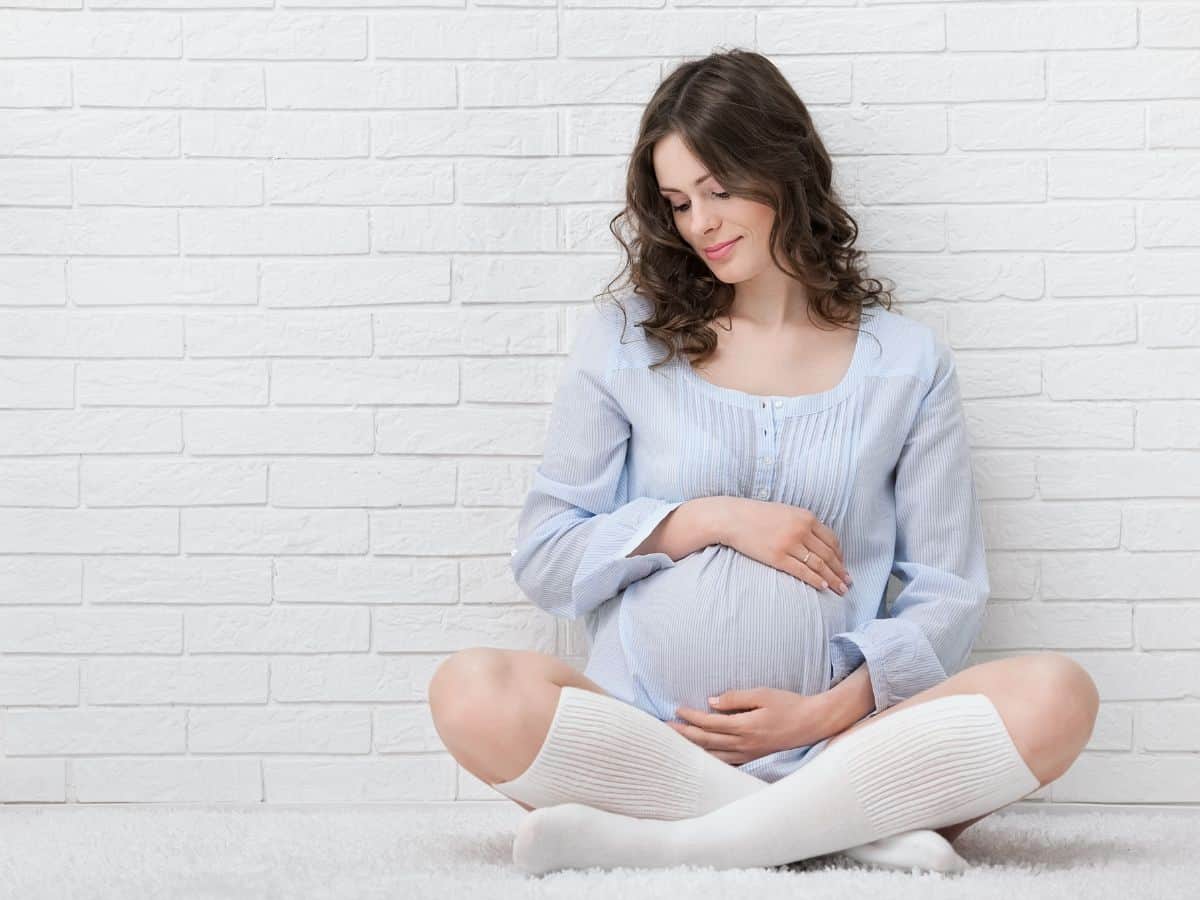 a pregnant woman with beautiful hair