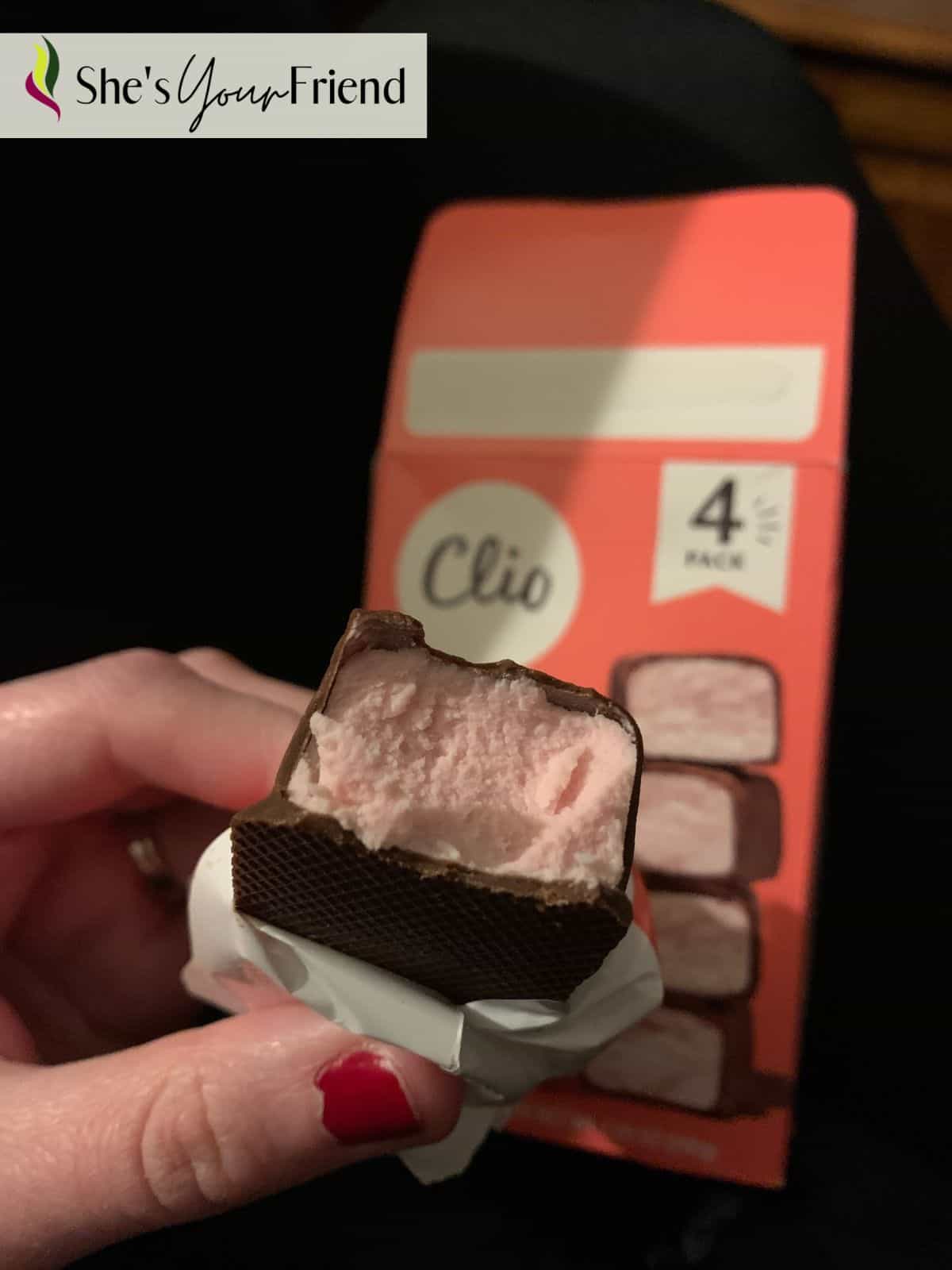 a close up of a yogurt bar that has a bite out of it