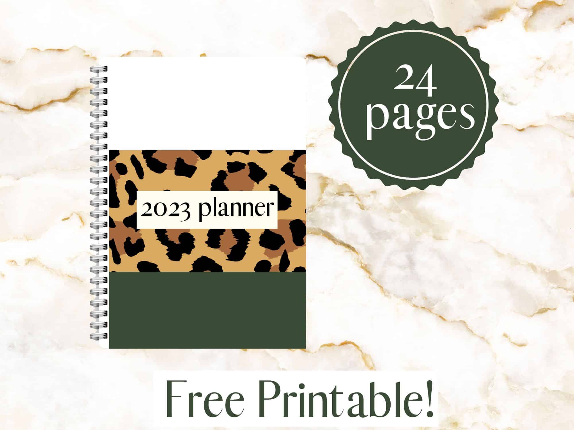 a 2023 planner with text overlay that reads free printable and 24 pages