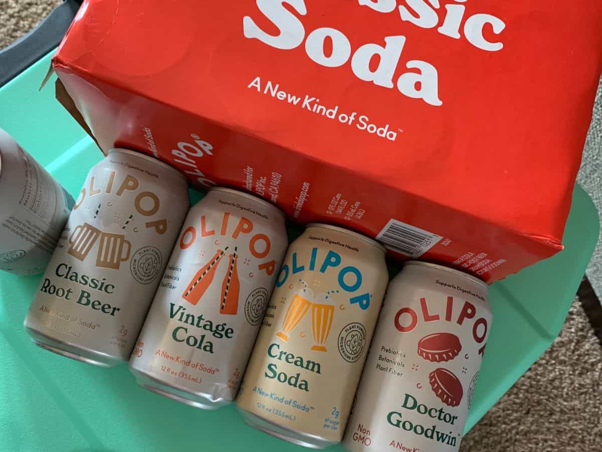 four cans of olipop classic soda
