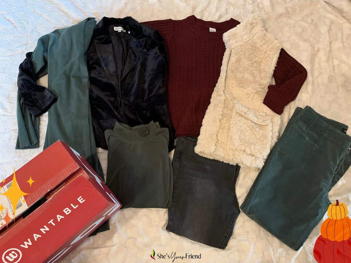 a wantable box with seven items of clothes 